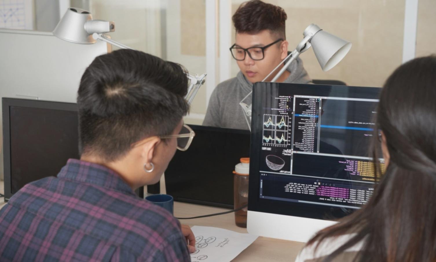 Artist working with AI tools in a creative studio environment